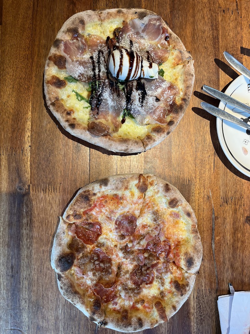 Artisan pizzas served at Di Martina